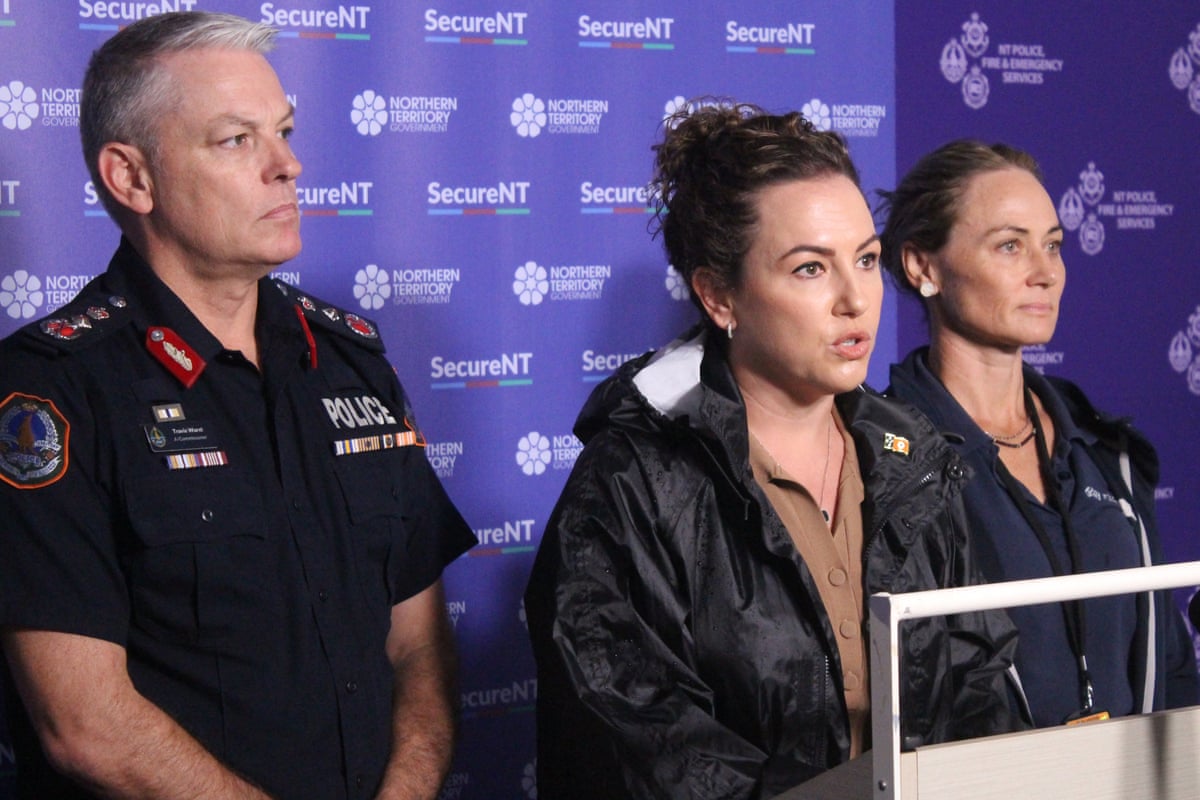 NT chief minister Lia Finocchiaro (centre) speaks to media
