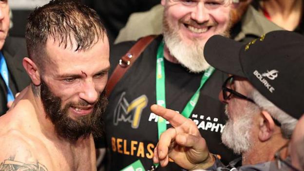 Anthony Cacace is congratulated by his father, Tony