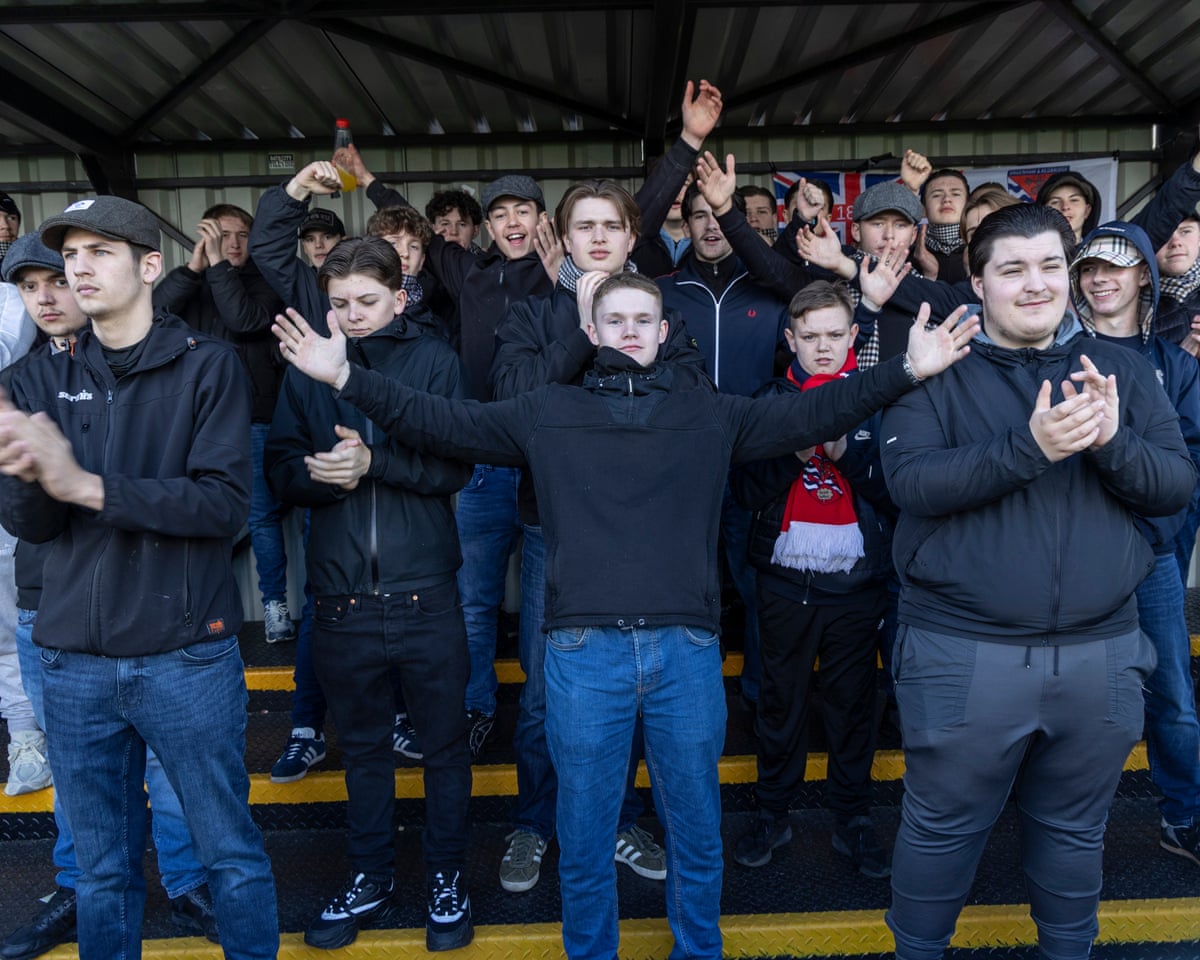 Dagenham and Redbridge fans cheer on their team in their 0-0 draw at Enfield Town in the National League South.