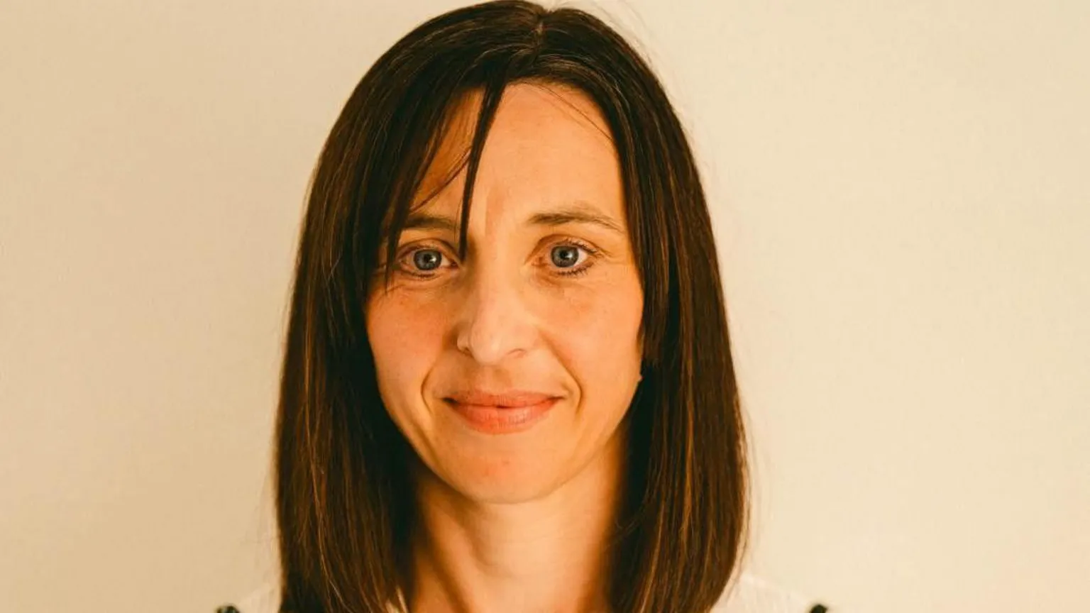 HANDOUT A woman looking at the camera, she has brown hair.