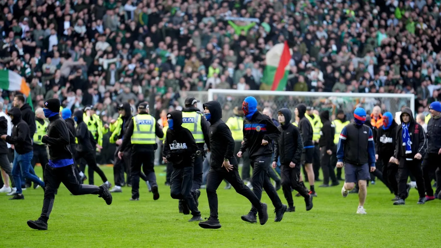 Pitch invasion after Celtic win on penalties after the Scottish Gas Men's Scottish Cup quarter-final match at Ibrox Stadium, Glasgow. Picture date: Sunday March 8, 2026.