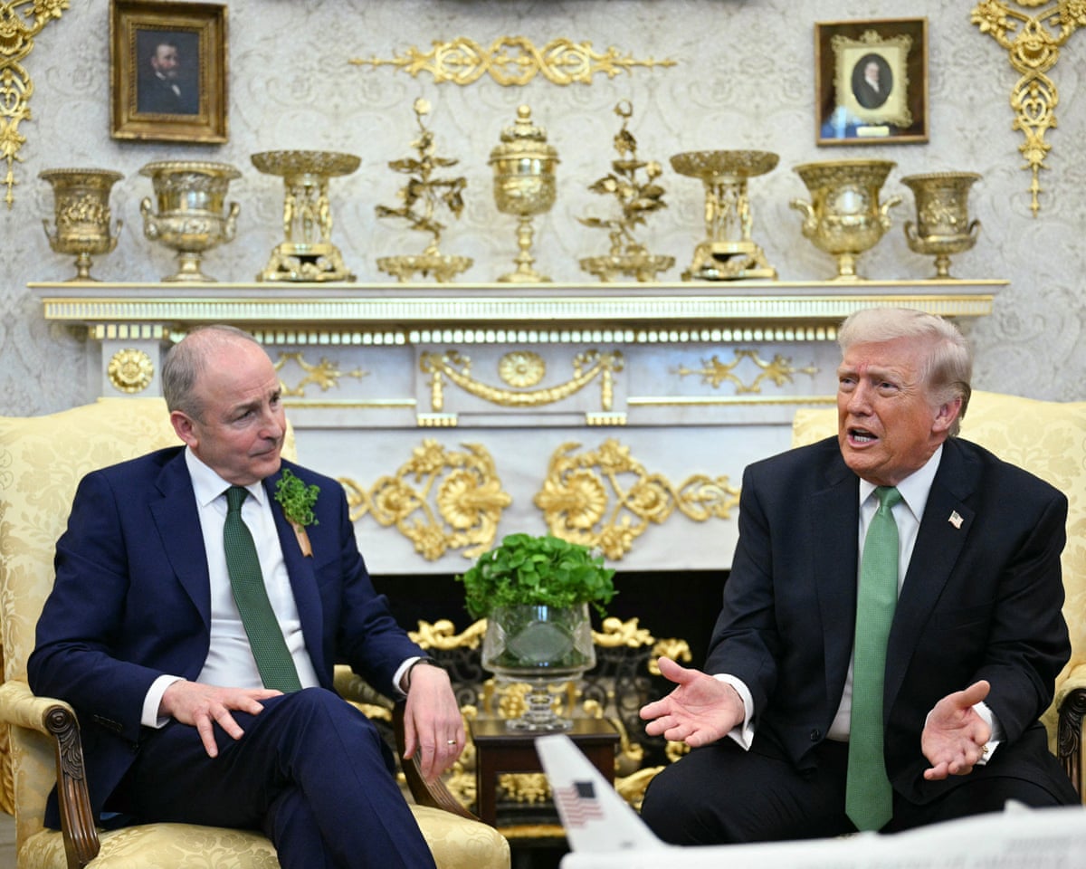 Donald Trump sits beside the taoiseach of Ireland Micheál Martin during a bilateral meeting in the Oval Office.
