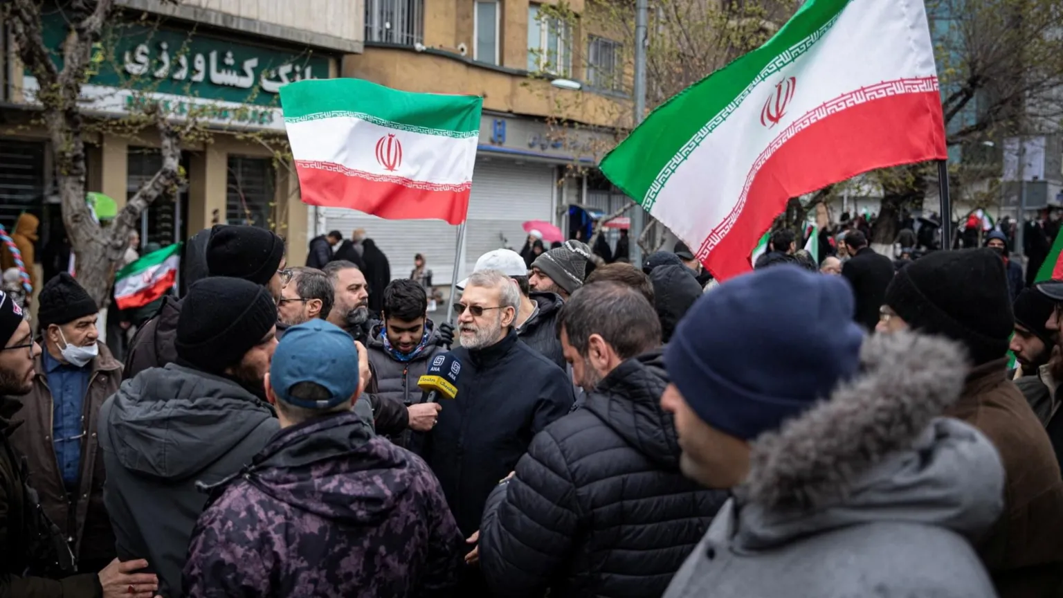 Ali Larijani via X/via A social media photo posted by Ali Larijani showing him speaking to Iranian TV while taking part in a pro-government Quds Day rally in Tehran, Iran (13 March 2026)