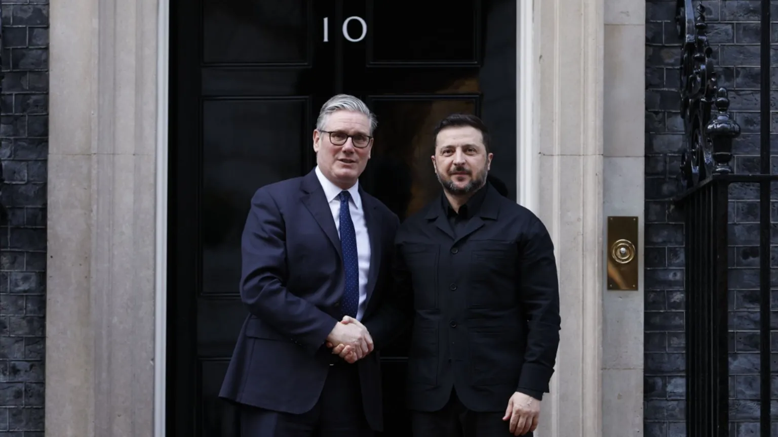 EPA/Shutterstock Prime Minister Keir Starmer (L) greets Ukrainian President Volodymyr Zelensky (R) in Downing Street, London. Zelensky is wearing a black jacket as he shakes the hand of Starmer who is wearing a navy suit and white shirt