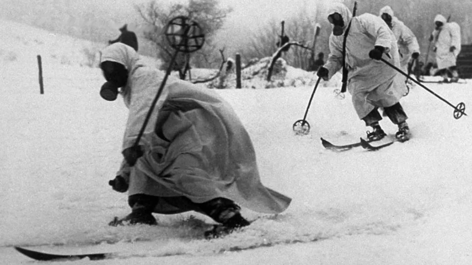  Finnish ski troops wearing gas masks in 1940 as they go into battle against the Soviet Union