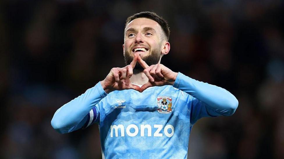 Matt Grimes celebrates scoring for Coventry 