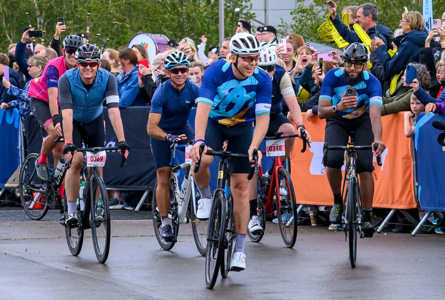  Sir Chris Hoy leads a group of cyclists at the start of a cycling event