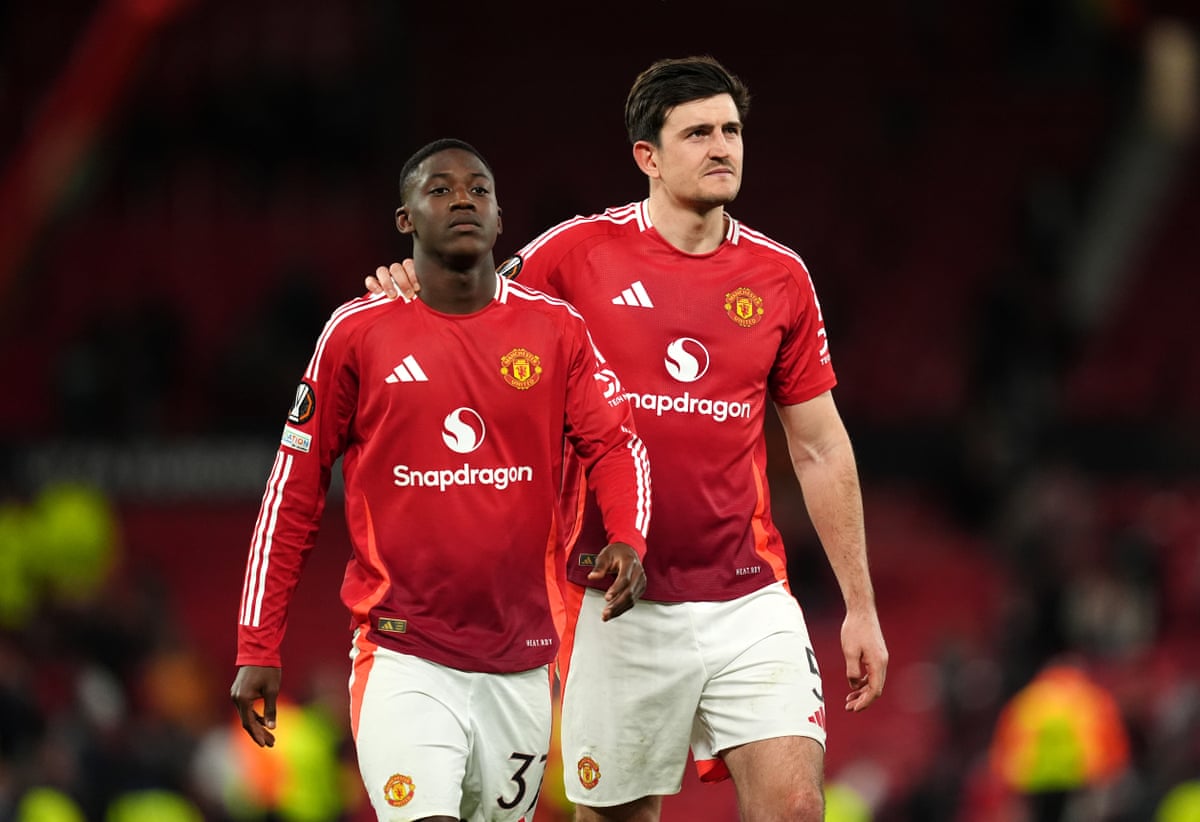 Manchester United’s Kobbie Mainoo and Harry Maguire celebrate following the UEFA Europa League quarter-final, second leg match at Old Trafford on April 17, 2025.