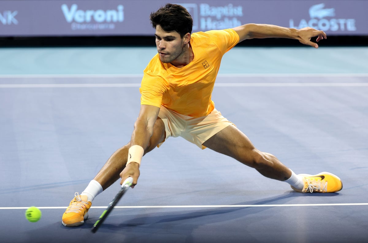 World No 1 Carlos Alcaraz returns a shot against Joao Fonseca at the Miami Open