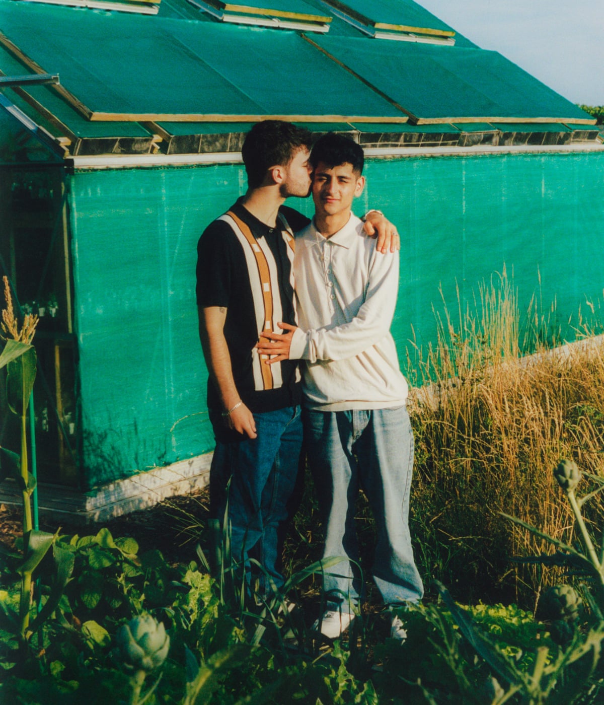 Davide and Reece embracing