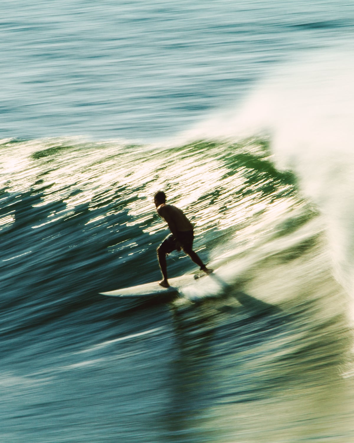 A surfer riding a wave