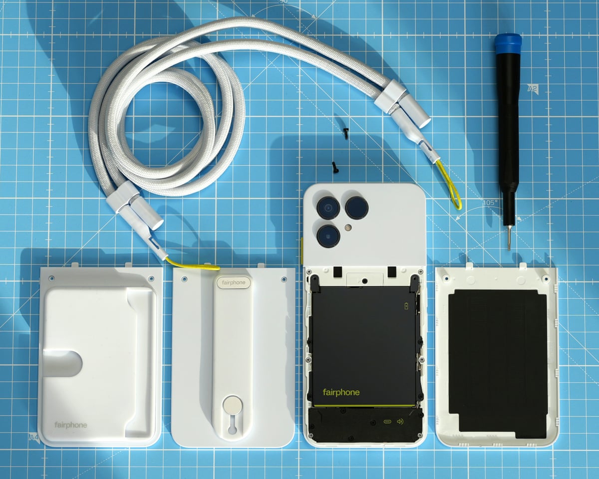 The Fairphone 6 with back plate removed and lined up with a selection of modular accessories.