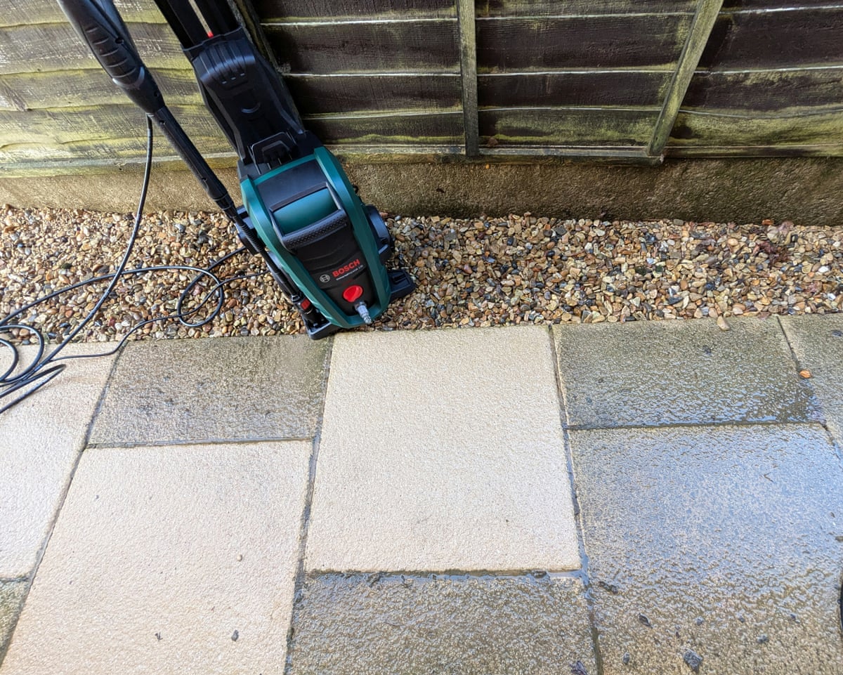 A patio slab after the Bosch UniversalAquatak 135 pressure washer cleaned it