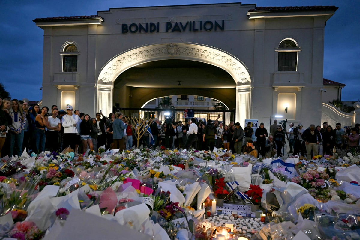 Mourners gather at a tribute at the Bondi Pavillion in memory of the victims of the shooting at Bondi Beach