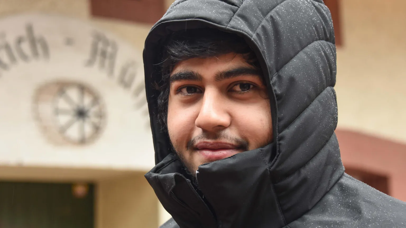 Ishu Gariya wearing a hooded jacket