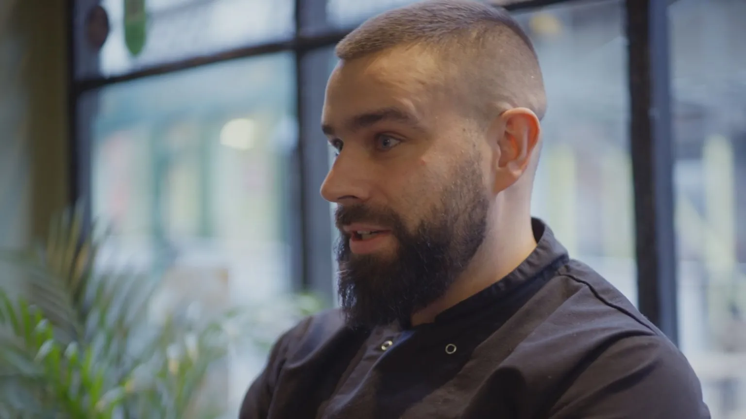 James wearing black chefs clothing