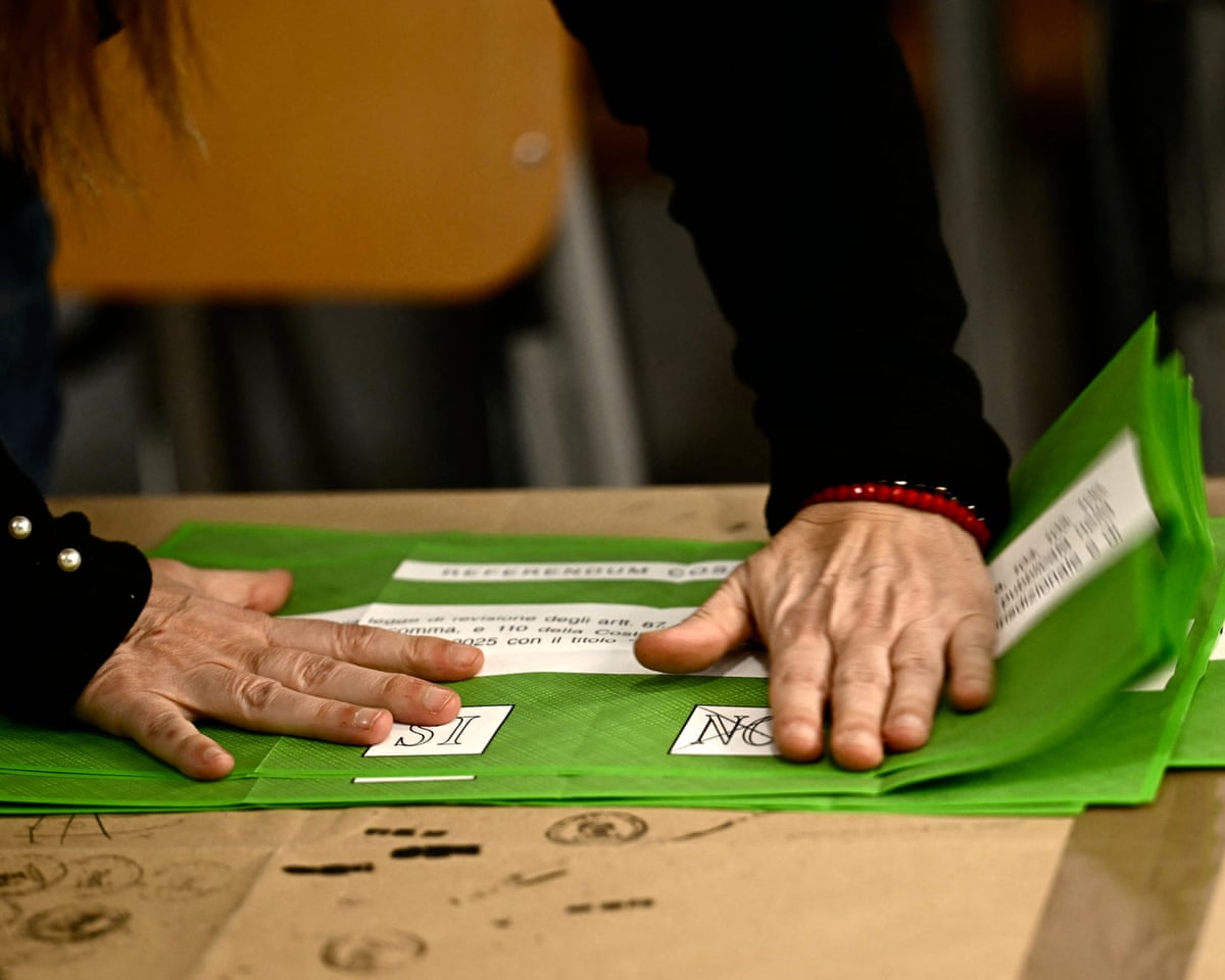 A person prepares the counting of the ballot boxes of the Constitutional referendum on Justice reform, in a polling station of Rome, Italy.