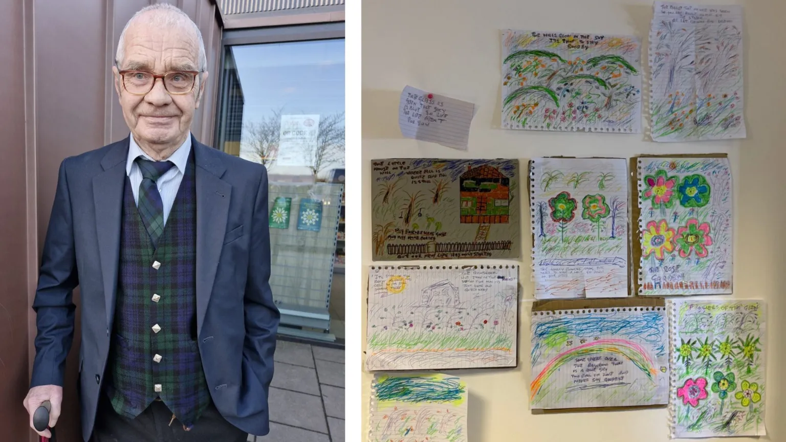 Paul standing next to a wall of artwork he has created. He has an almost bald head and brown-rimmed glasses. He is wearing a blue suit jacket, light blue shirt and a blue and green tartan waistcoat and matching tartan tie. He is leaning on a stick.