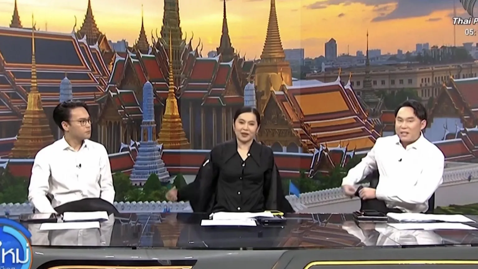 DRM News Sirima Songklin and her fellow news presenters taking off their jackets