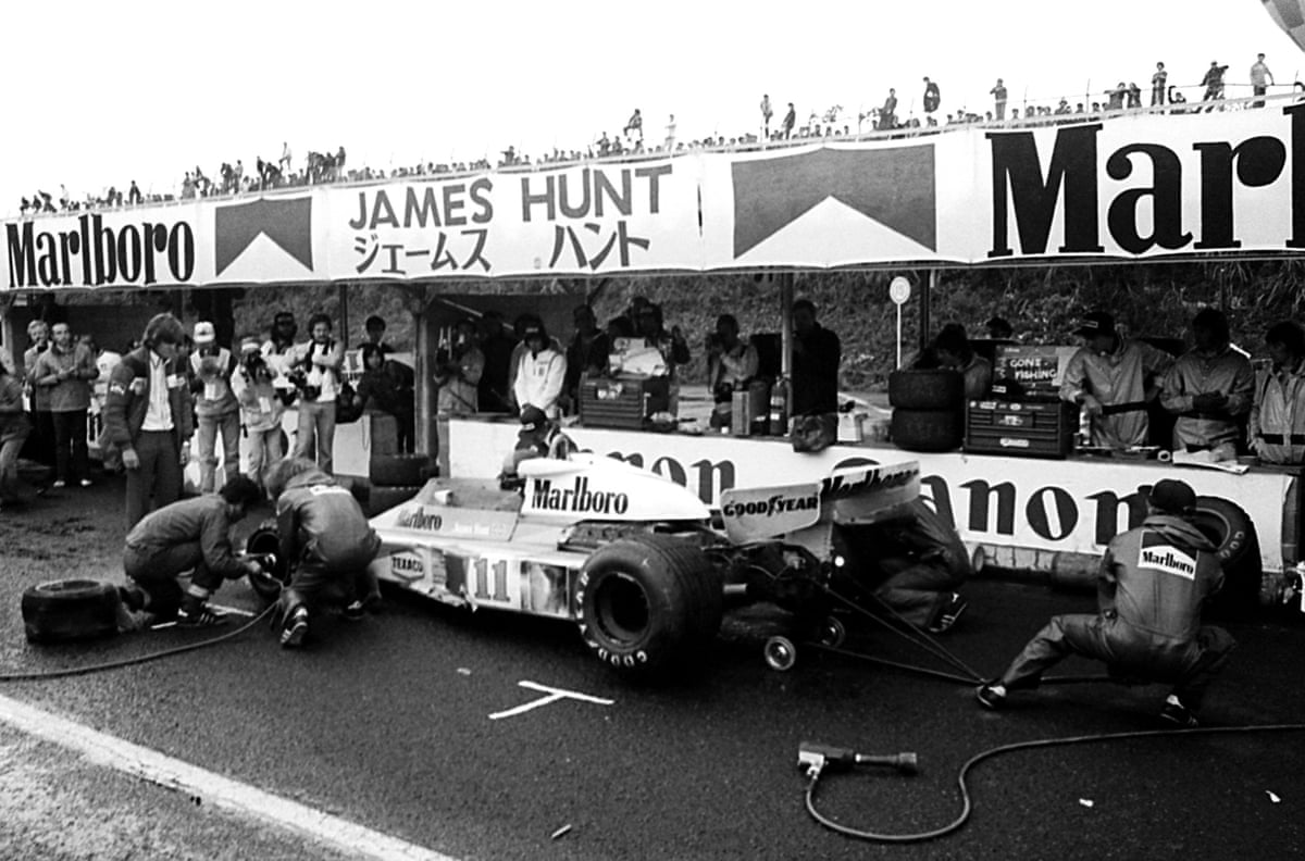 James Hunt makes a crucial pit stop in the closing stages of the race to replace a tyre