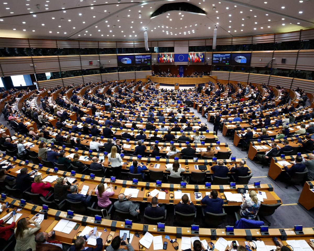 Members of the European Parliament attend a session to vote on legislation to cut import duties for US products, in Brussels, Belgium.
