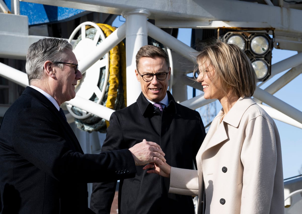 Keir Starmer (left) with the Finnish president Alexander Stubb and Iceland’s PM Kristrun Mjoll Frostadottir onboard the Finnish Border Guard vessel Turva at the JEF leaders’ summit.