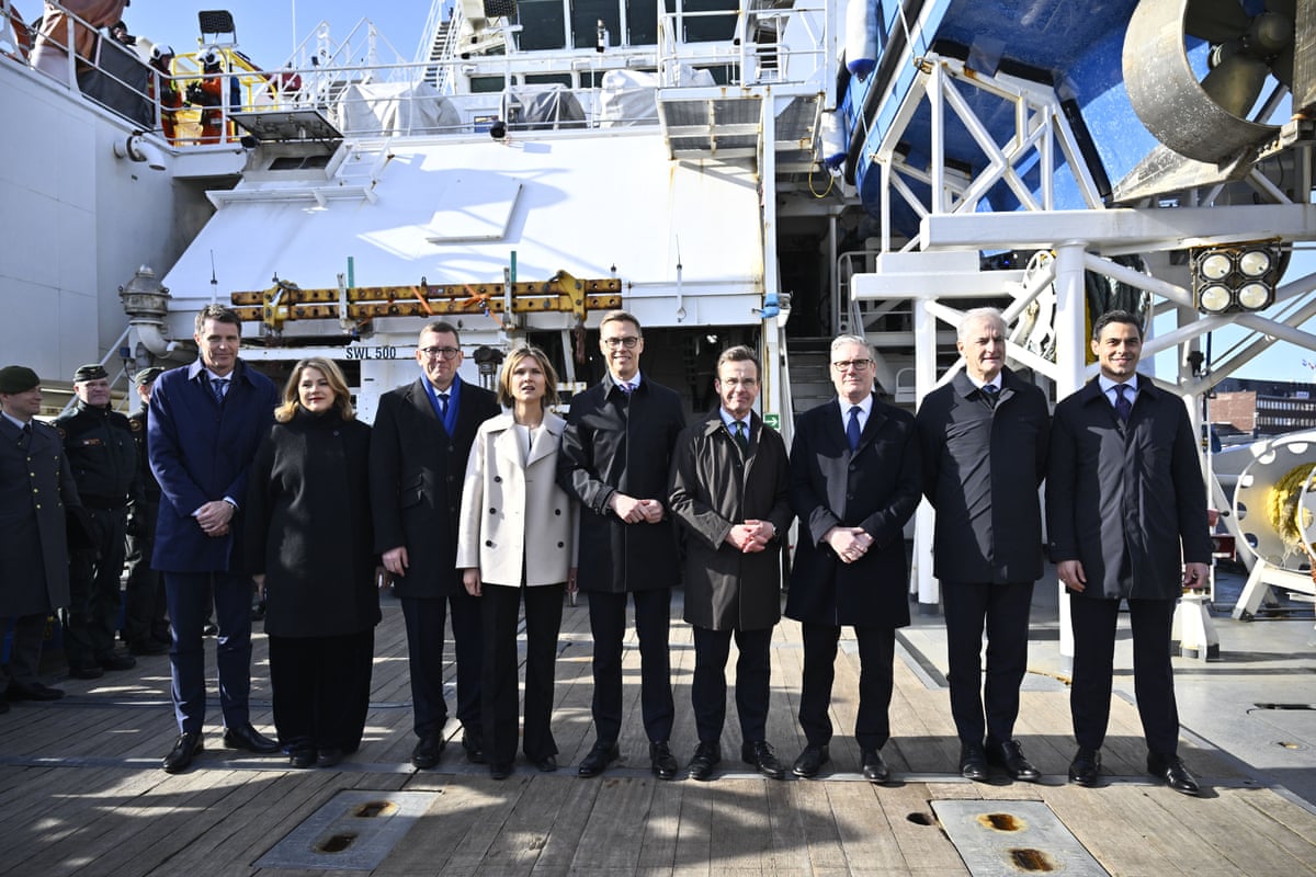JEF leaders from left: Anders Tang Friborg, Danish foreign minister; Evika Silina, Latvia’s PM; Kristen Michal, Estonia’s PM; Kristrún Frostadóttir, Iceland’s PM: Alexander Stubb, Finland’s president; Ulf Kristersson, Sweden’s PM; Keir Starmer; Jonas Gahr Støre, Norway’s PM; and Rob Jetten, prime minister of the Netherlands. They are on the Finnish border guard ship Turva.