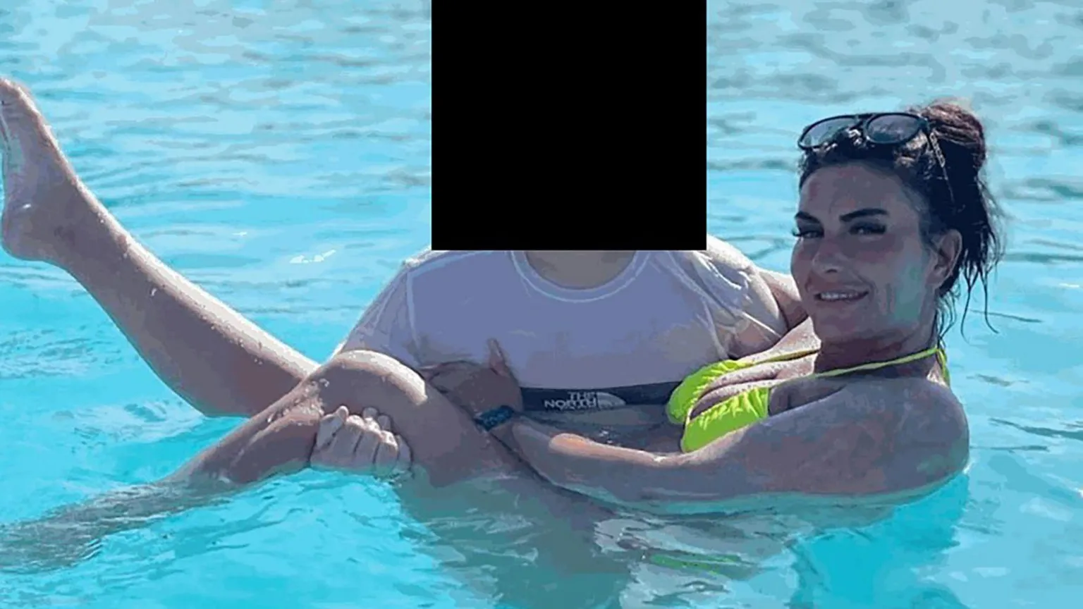  Catherine Wieland posing in a swimming pool. 