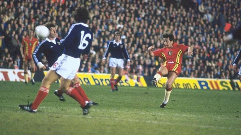Wales' Brian Flynn having a shot against Scotland