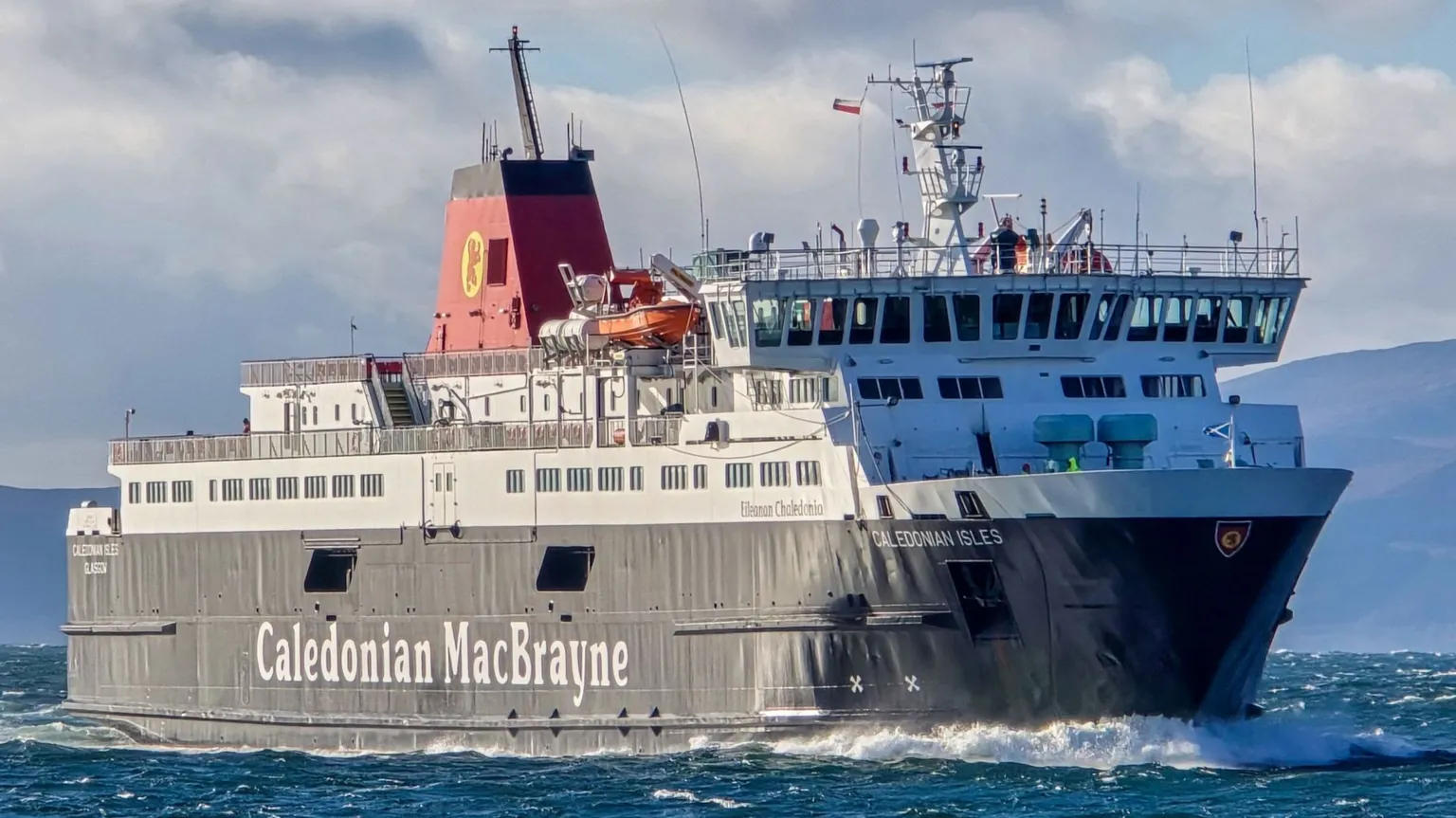 Christopher Brindle A large black and white ship with red funnels, MV Caledonian Isles