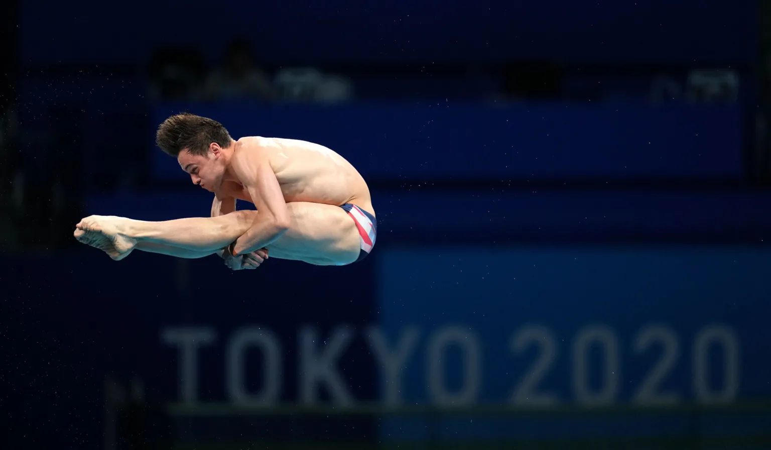 Tom Daley mid-dive