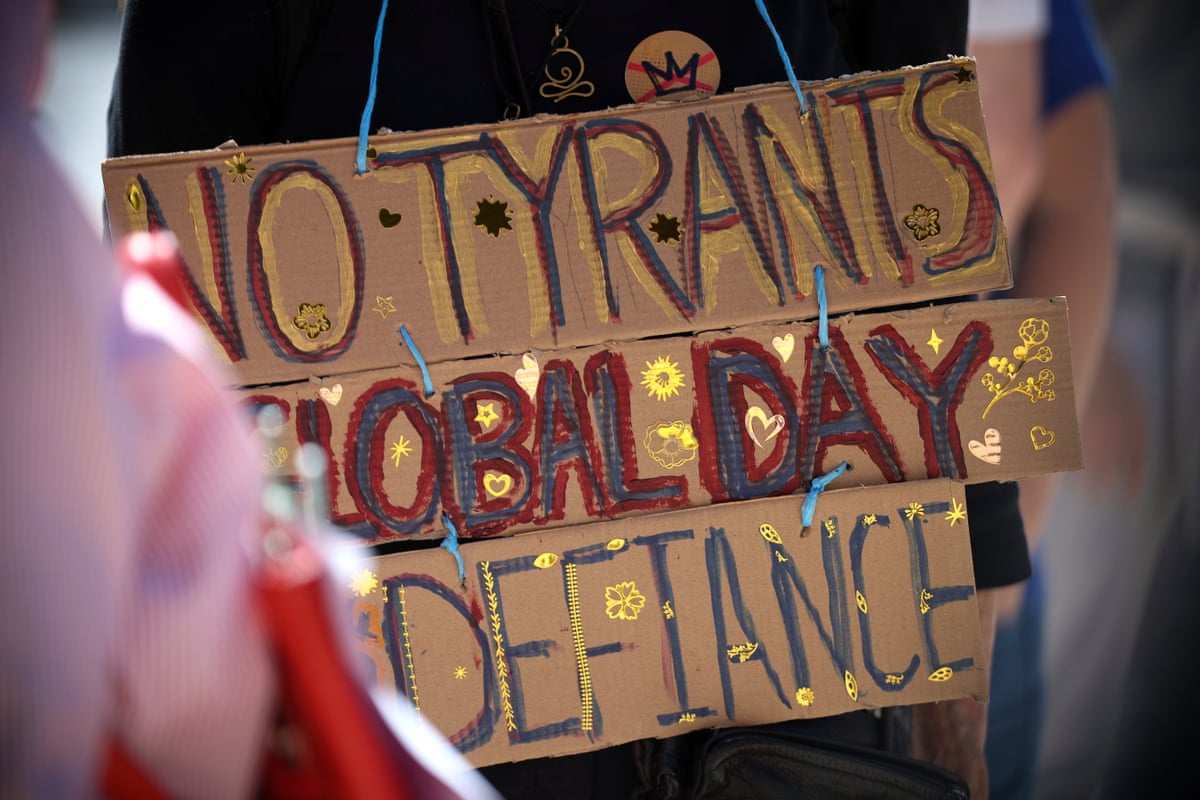 People attend a No Kings rally in Porto, Portugal, on Saturday.