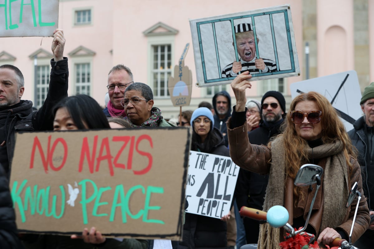 Activists attend a No Kings protest against the Trump administration on Saturday in Berlin, Germany.