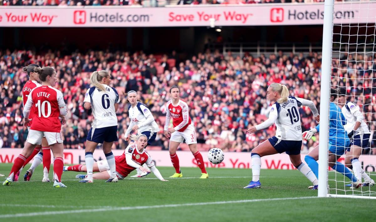 Russo directs a diving header into the Spurs net.