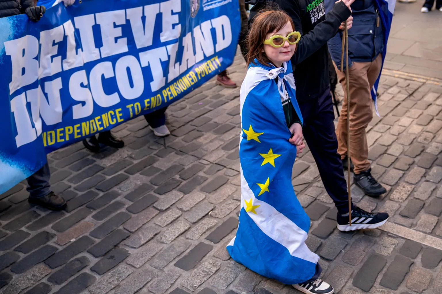  A young girl - draped in a saltire flag - takes part in a march and rally for independence organised by Believe in Scotland, which aims to celebrate Scotland's potential, its culture and its people in Edinburgh.