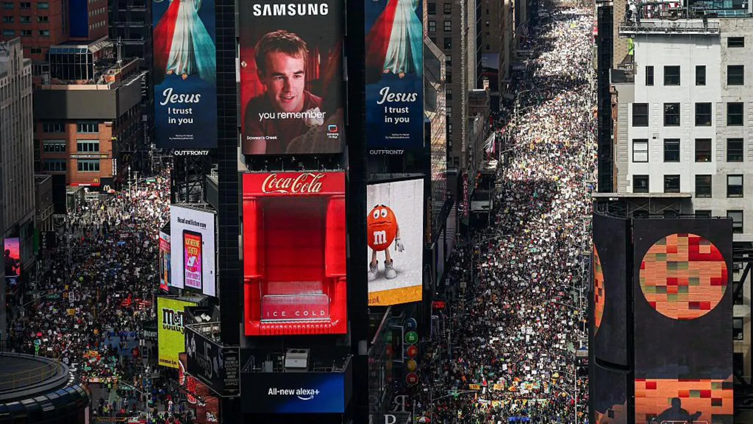  Massive crowds in the streets in Times Square shown from an aerial view