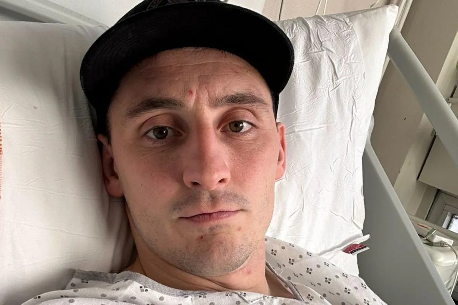 Sam Davies Sam Davies lying on a hospital bed 