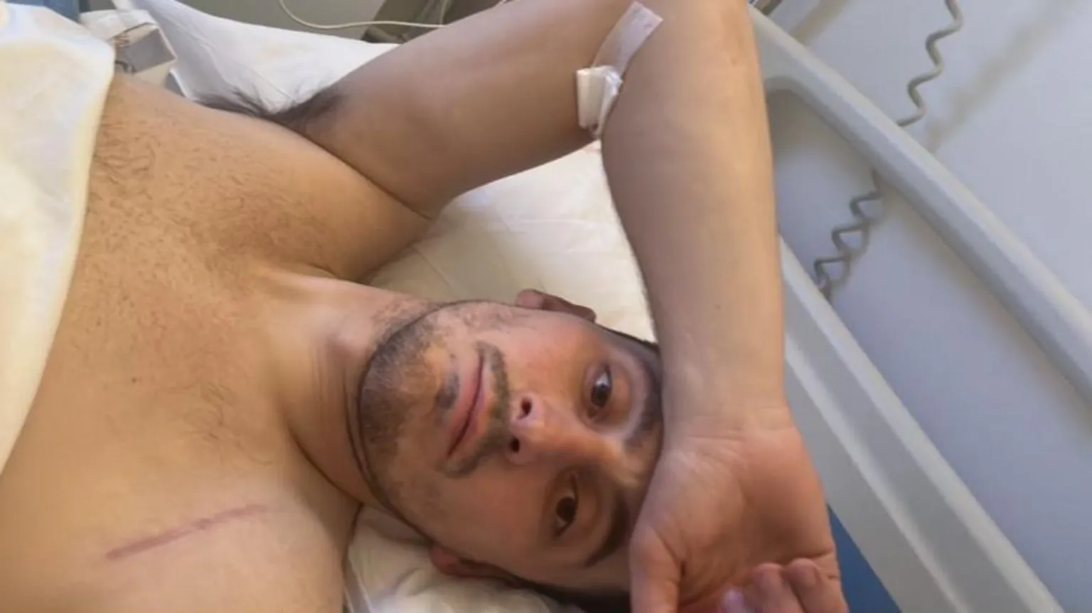 Sam Davies Sam Davies lying in a hospital bed