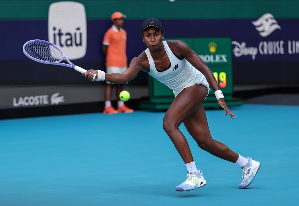 Coco Gauff stretches for a forehand against Aryna Sabalenka