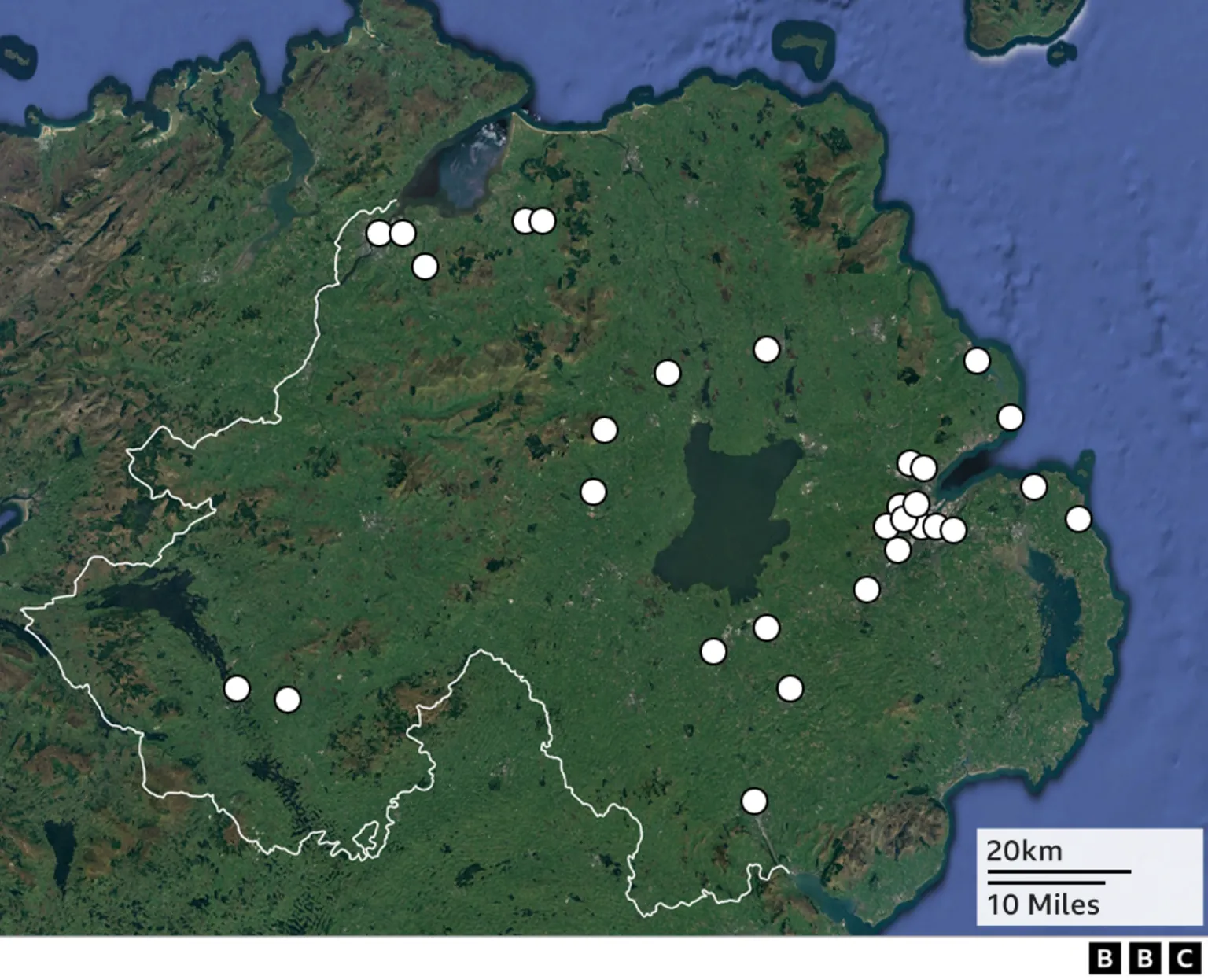 A map of Northern Ireland showing the location of 30 murders of women. The map is green with the locations highlighted by a white dot.