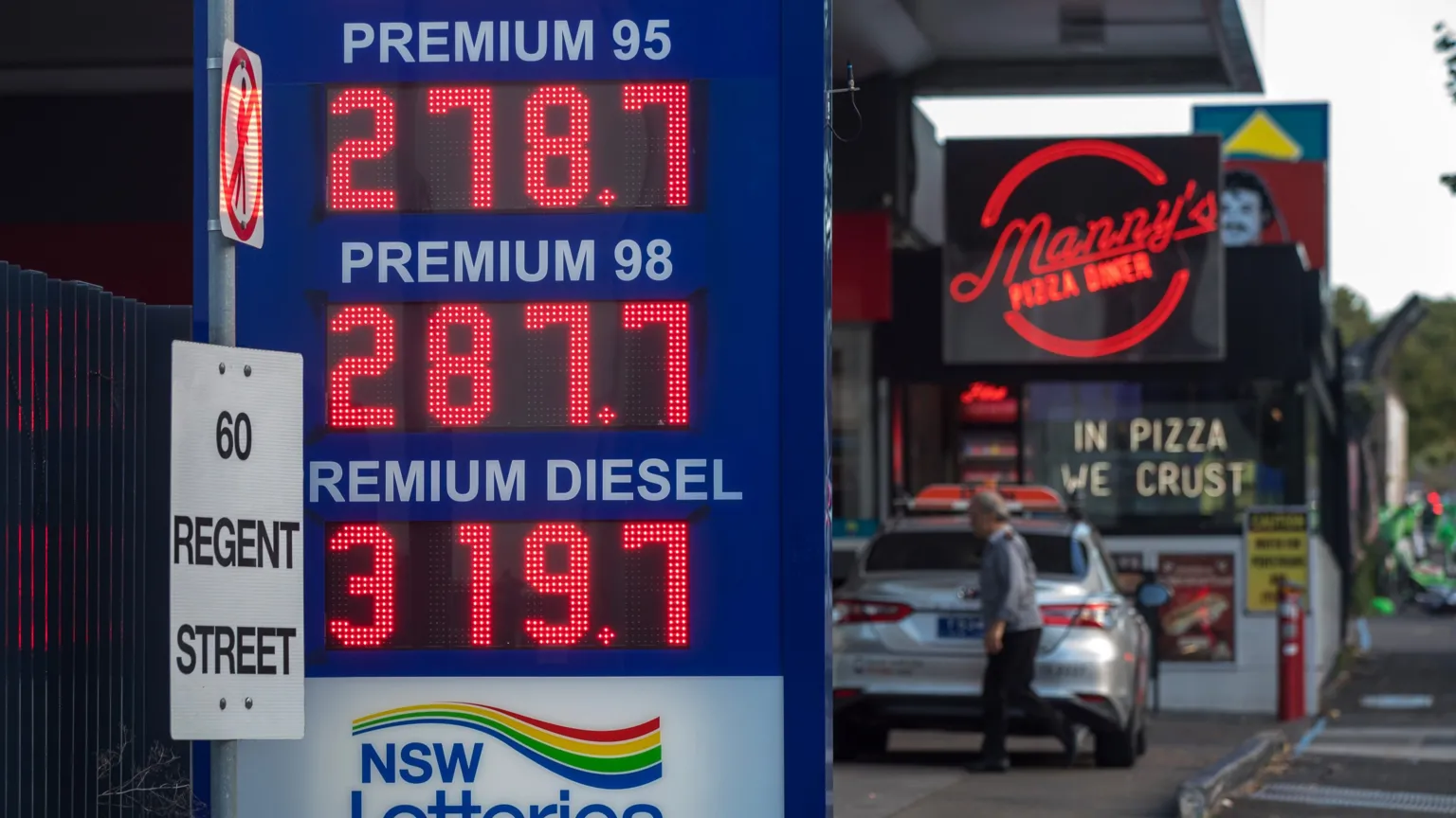  Petrol prices displayed at a petrol station in Sydney, Australia