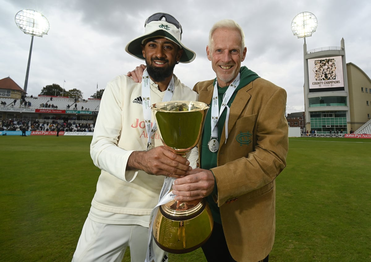 Nottinghamshire captain Haseeb Hameed and coach Peter Moores with the County Championship trophy in September