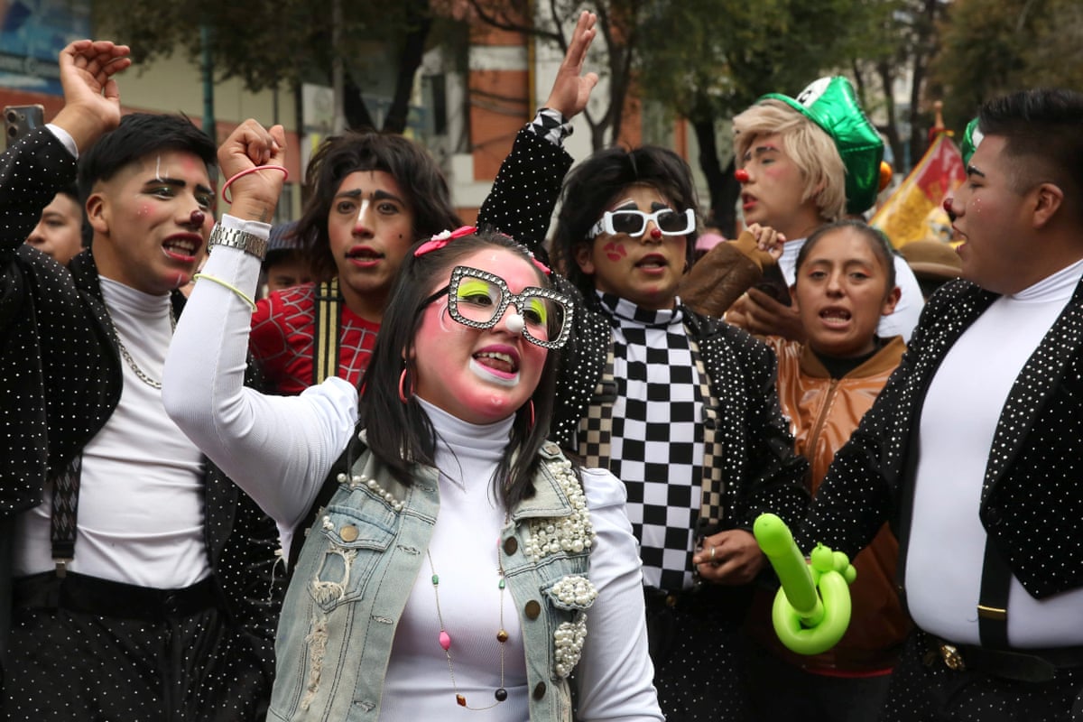Clowns take part in a protest outside the Ministry of Education in La Paz, Bolivia,