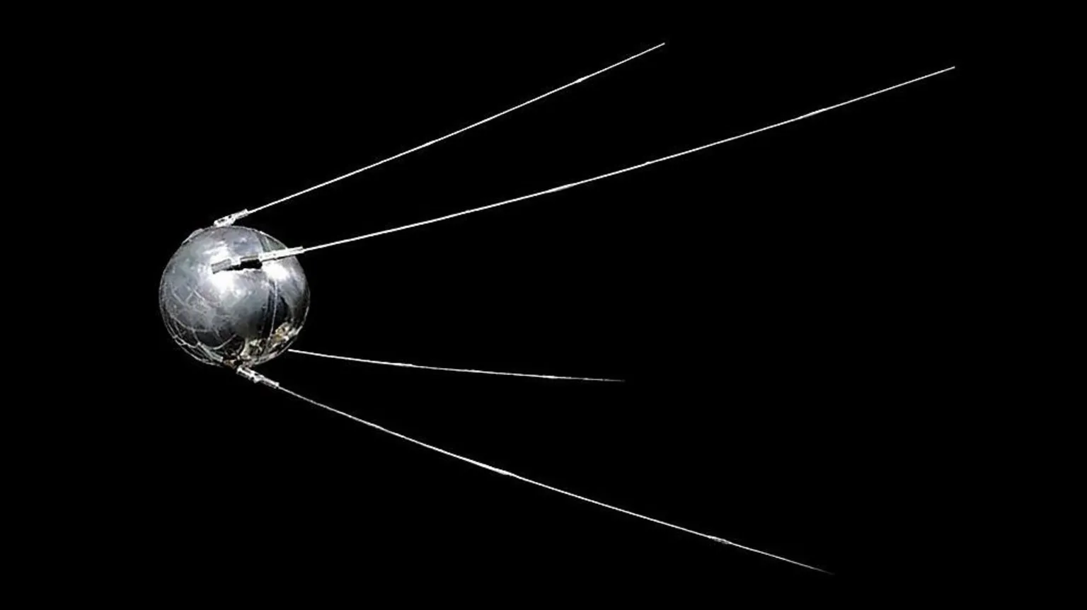 Universal History Archive/Universal Images Group via Sputnik 1, a polished metal sphere with four external radio antennas, against a black background 