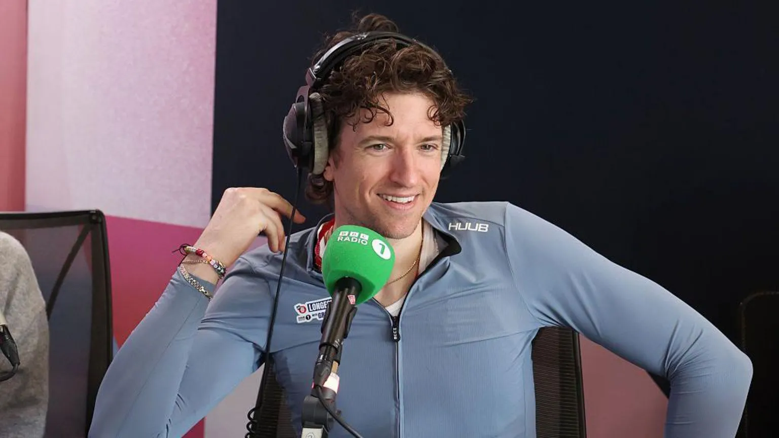 Greg James at a Radio 1 interview after he crosses the finish line during the Radio 1 Longest Ride challenge for Comic Relief at Murrayfield Stadium on March 20, 2026 in Edinburgh, Scotland. BBC Radio 1 presenter Greg James took on a 100km-a-day tandem cycling challenge across the UK for Comic Relief, riding for eight days from Weymouth to the finish line in Edinburgh