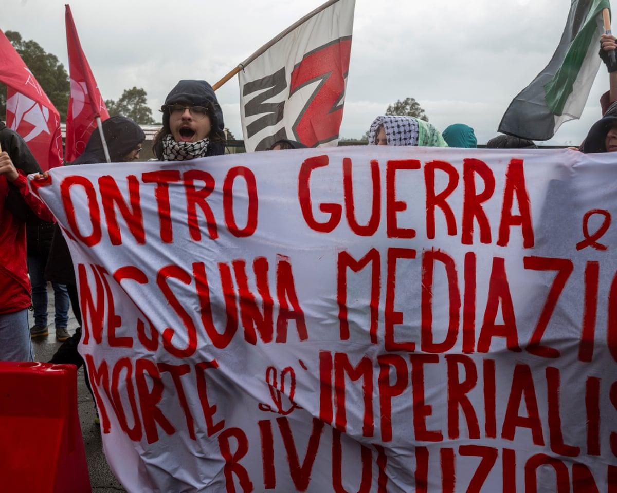 Civil associations, unions, peace activists and members of No MUOS movement gather in front of the US naval airbase to protest against US and Israel’s attacks on Iran earlier this month.