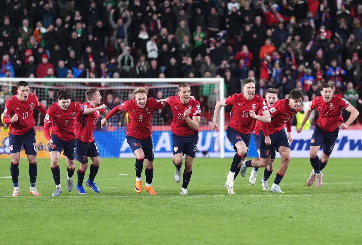Czech Republic players celebrate victory after a penalty shootout in the 2026 World Cup playoff semi-final match against the Republic of Ireland