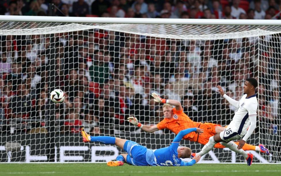Iceland player scores a goal against England