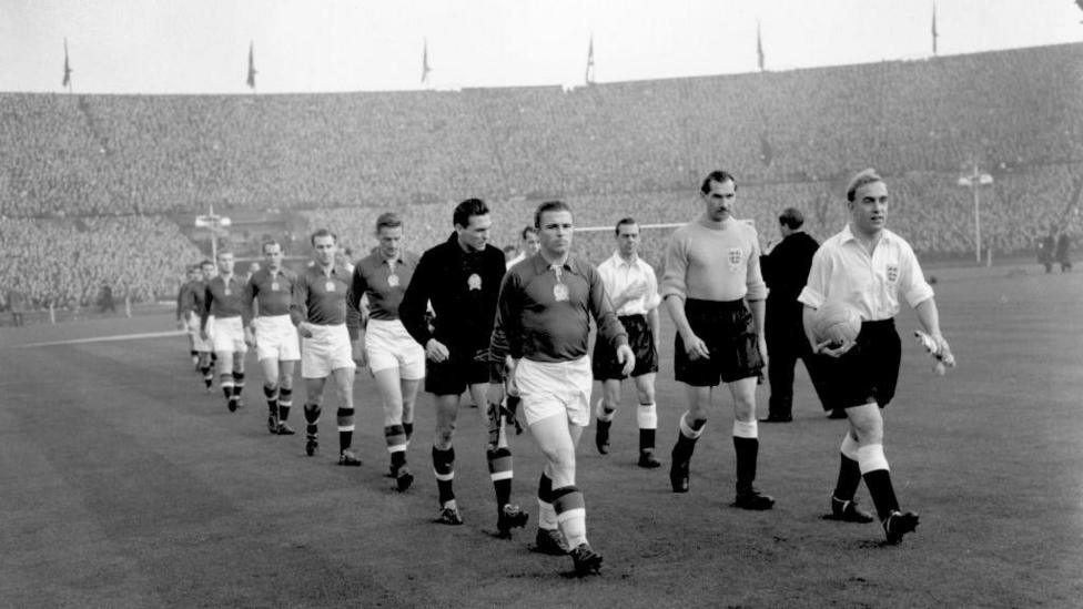 England and Hungary players walk out at Wembley in 1953
