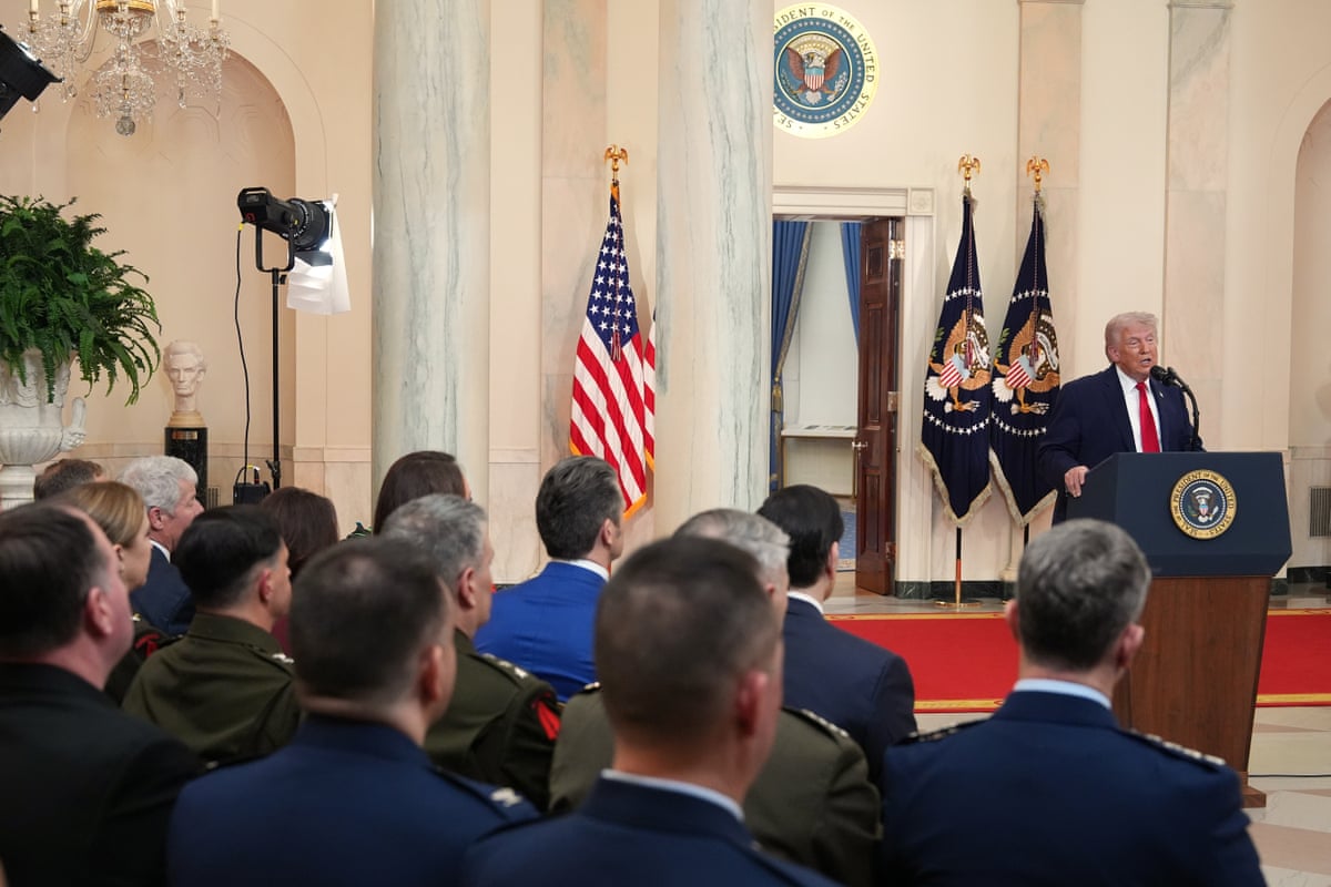 Donald Trump speaks about the Iran war from the Cross Hall of the White House.